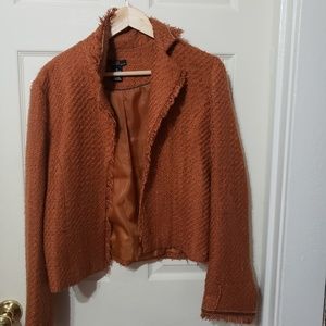Rust colored jacket, bell sleeves L